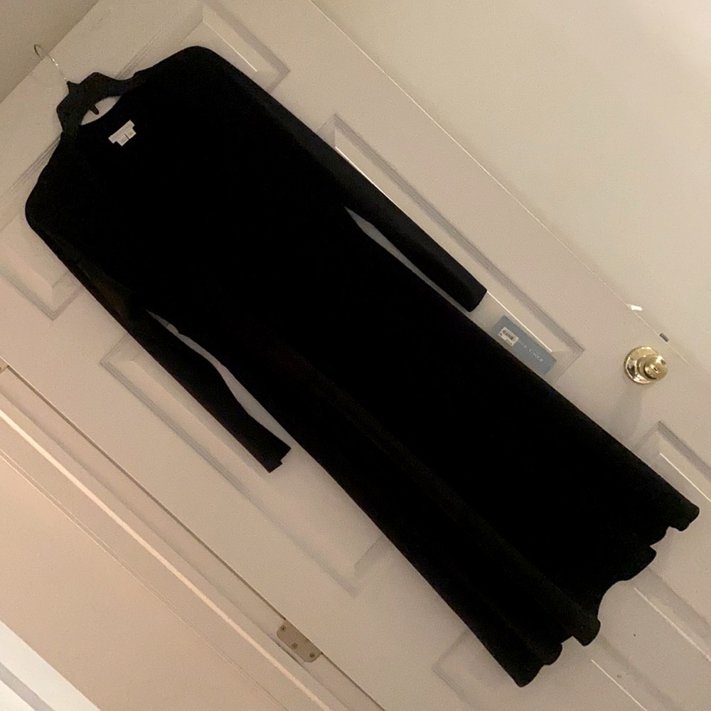 Black dress with criss cross pleats